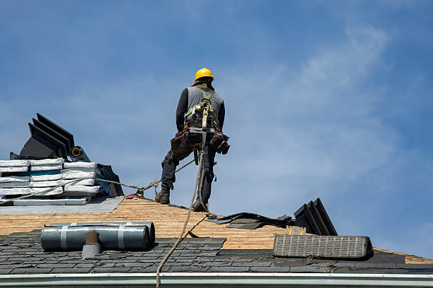 Professional Roof Replacement technician working in Marshfield, MO